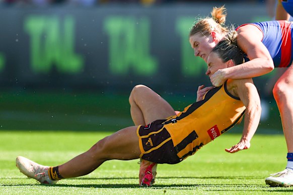 Hawthorn’s Emily Bates goes to ground with a knee injury.