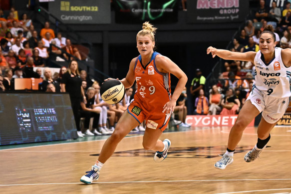 Shyla Heal of the Fire drives up court during game one of the WNBL Grand Final Series between Townsville Fire and Southside Flyers at Townsville Entertainment Centre, on March 18, 2023.