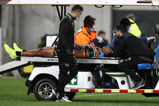 Michael Chee Kam is taken from the field against Parramatta.