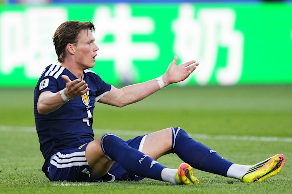 Scott McTominay protests to the referee.