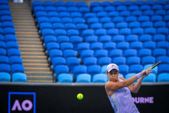 Ash Barty plays Ekaterina Alexandrova in an empty Margaret Court arena last Saturday because of the stage-four lockdown in Victoria. 