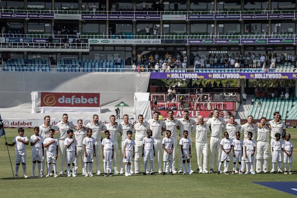 Few spectators were present to stand for the national anthems on Friday.