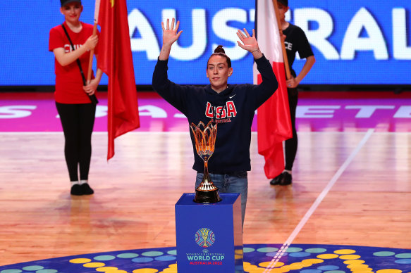 Stewart waves after presenting the trophy.