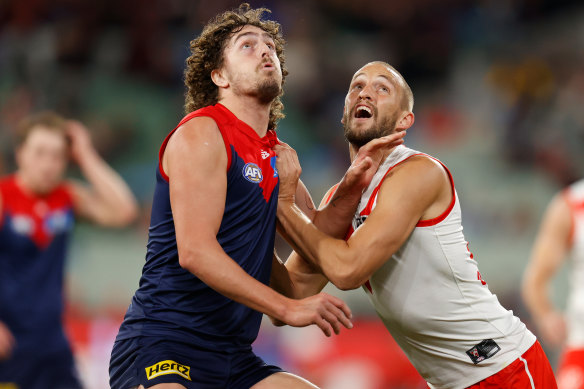 Luke Jackson and Sam Reid battle it out.