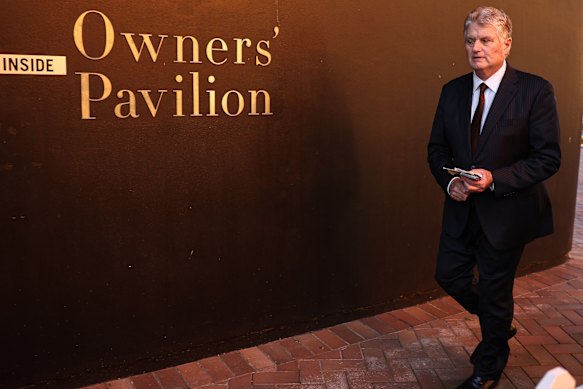 ATC chairman Peter McGauran leaves the meeting of members at Randwick racecourse on Tuesday.