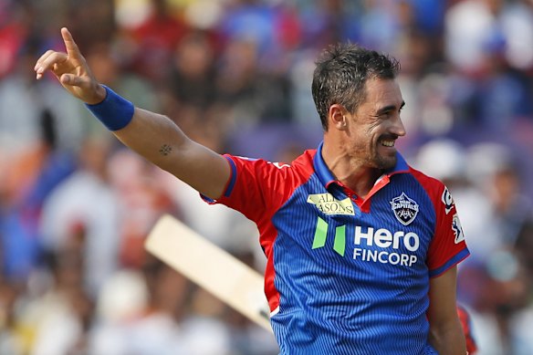 Delhi Capitals’ Mitchell Starc celebrates a wicket.