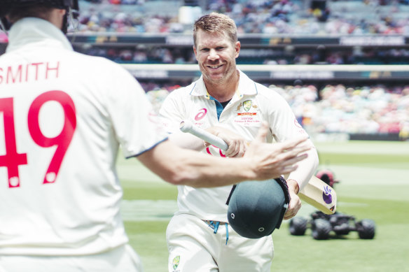 David Warner embraces Steve Smith as he leaves the Test arena for the final time.