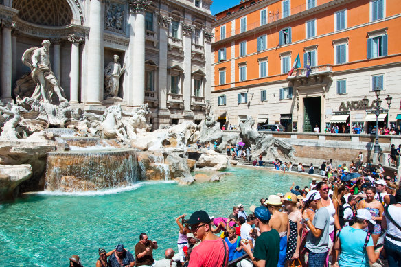  Rome’s Trevi fountain which saw crowds at 6.30am this year.