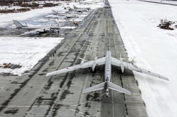 A Tu-95 bomber at a Russian airbase. Russia has intensified its military drills.