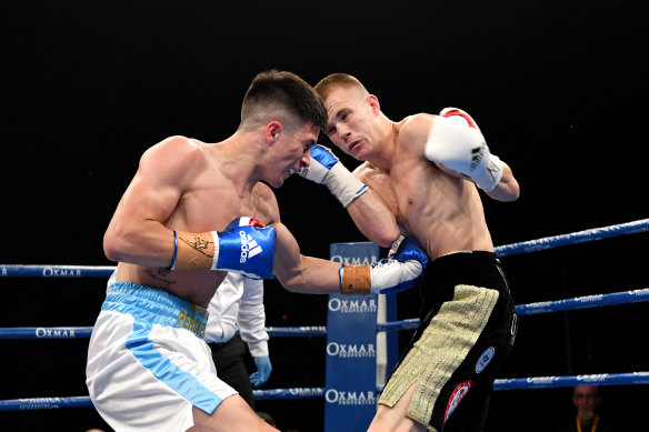 Liam Wilson, right, fighting Mauro Perouene of Argentina in Brisbane in 2019.