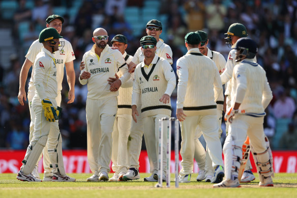 Nathan Lyon celebrates after taking the wicket of Ravindra Jadeja. 