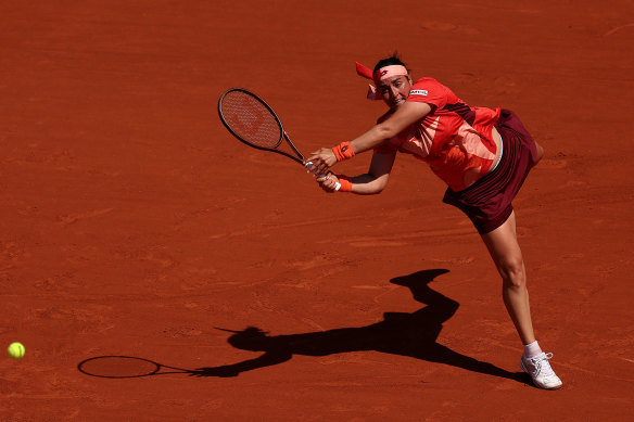 Backhand magic: Ons Jabeur in full flight against Bernarda Pera.