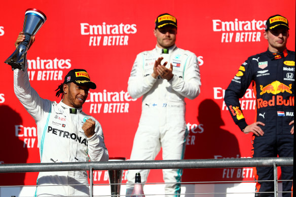 Lewis Hamilton (left) won his third F1 title in succession and sixth overall in the USA this month.