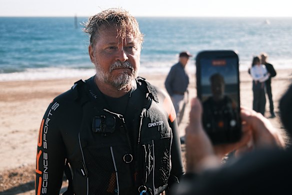 Journey’s end: Bushby comes ashore in Dover earlier this month having swum the English Channel.