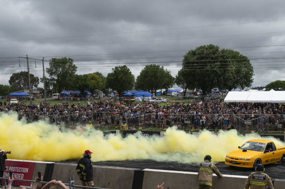 Cars compete in the official Summernats burnout competition.