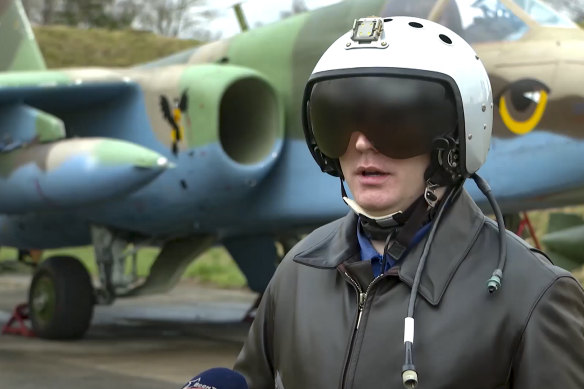 A Belarusian air force pilot speaks at an unidentified location last month.