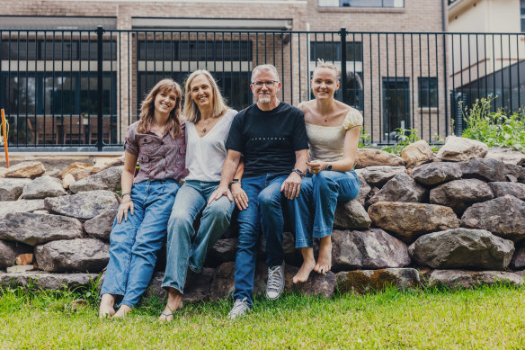 Craig and Alison Whalland at home with their daughters Amy and Jordan.