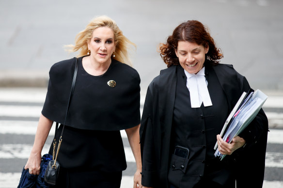 With Gina Edwards (left) at Edwards’ defamation case.