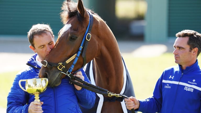 Charlie Appleby (left) and strapper Tash Eaton of team Godolphin pose with Cross Counter at Werribee on Wednesday.