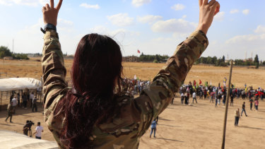 A Kurdish fighter for the Syrian Democratic Forces on October 7.