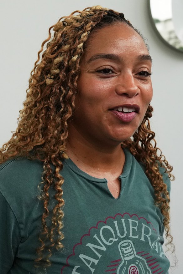 Shakeira Fairfax from New Jersey waits to greet her daughter, who has spent her first navy deployment on the Lincoln.
