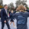 Then-premier Daniel Andrews announces a schools package on the campaign trail during the 2022 election campaign, with Planning Minister Sonya Kilkenny (left).