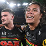 Nathan Cleary and Jarome Luai embrace after the Panthers’ victory in the 2021 NRL grand final at Suncorp Stadium.
