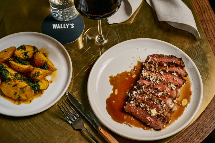 Sirloin in bordelaise sauce with a side of potatoes in butter sauce with herbs.
