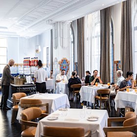 Wonderful, natural light gleams on black floorboards of The Lodge Dining Room on level one of Rodd &amp; Gunn’s flagship store.