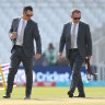 Ricky Ponting and Justin Langer inspect the pitch at the Oval during a Test match in 2023.