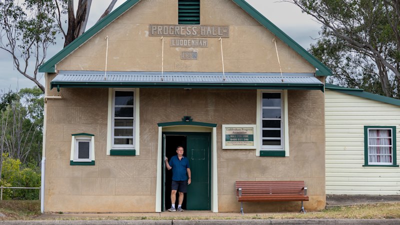 Next door to the new Sydney airport is a village residents fear will soon cease to exist
