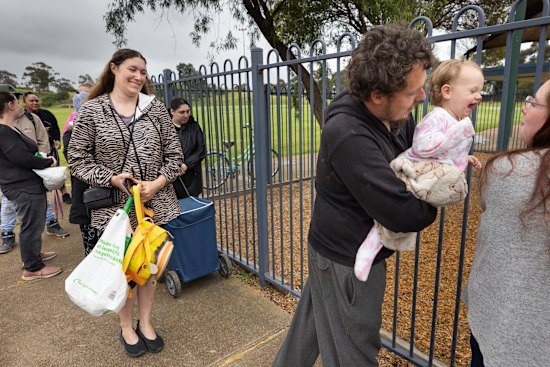 Kylie Whitlock, 36, and Aaron Eastgate , 28 with Evie , 13 months.