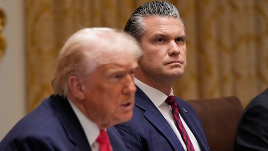 Donald Trump and Pete Hegseth at the White House on December 2.