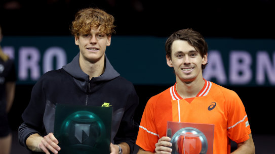 Jannik Sinner (left) with the winner’s trophy after beating Alex de Minaur in the men’s singles final in Rotterdam.