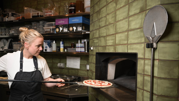 Figlia chef and “pizza-YOLO” Lucy Whitlow uses a high ratio of water to flour to achieve a crisp and airy crust.