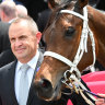 Chris Waller poses with his horse Aeliana.
