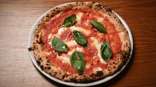 Lovely leopard spots dot the crust on the margherita pizza at Figlia.