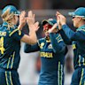 Aussies down South Africa in flying start to World Cup