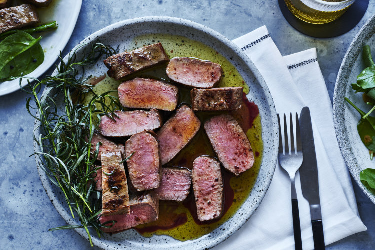 Lamb backstraps with rosemary butter.