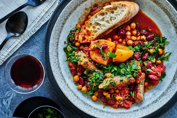 Spanish winter stew with chickpeas, beans and sausages.