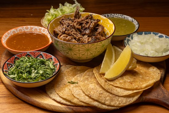 Taco platter with lamb barbacoa.