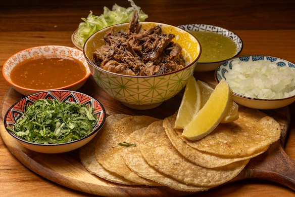 Taco platter with lamb barbacoa.