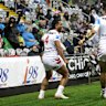 Matthew Feagai celebrates a try for the Dragons.