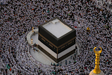 Muslim pilgrims circumambulate the Kaaba, the cubic building at the Grand Mosque, during the annual Hajj pilgrimage in Mecca, Saudi Arabia.
