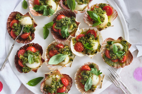 Danielle Alvarez’s scallops baked in the half-shell with tomatoes and herbed breadcrumbs.