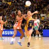 Maddy McAuliffe (right) in action for Sunshine Coast Lightning, against the Giants’ Serena Guthrie.