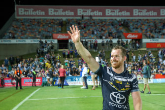 Cowboys captain Michael Morgan farewells 1300Smiles after their last game in the venue on August 29, 2019.