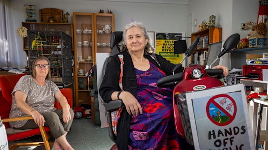 Margaret Kelly (seated), with friend and supporter Lyn Dixon, says she won’t leave her home.