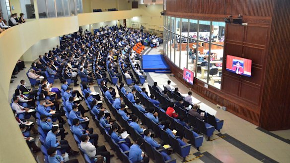 Visitors view the final proceedings of the tribunal on Thursday.