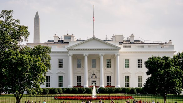 The flag atop the White House flew at half-staff over the weekend but was raised Monday and then lowered again amid criticism.